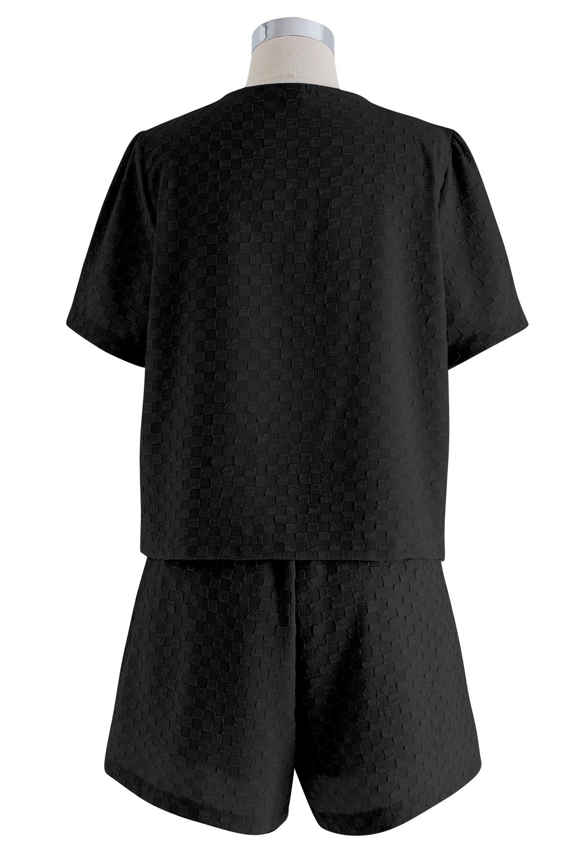 Conjunto de top y shorts con botones y bolsillos falsos con solapa en negro