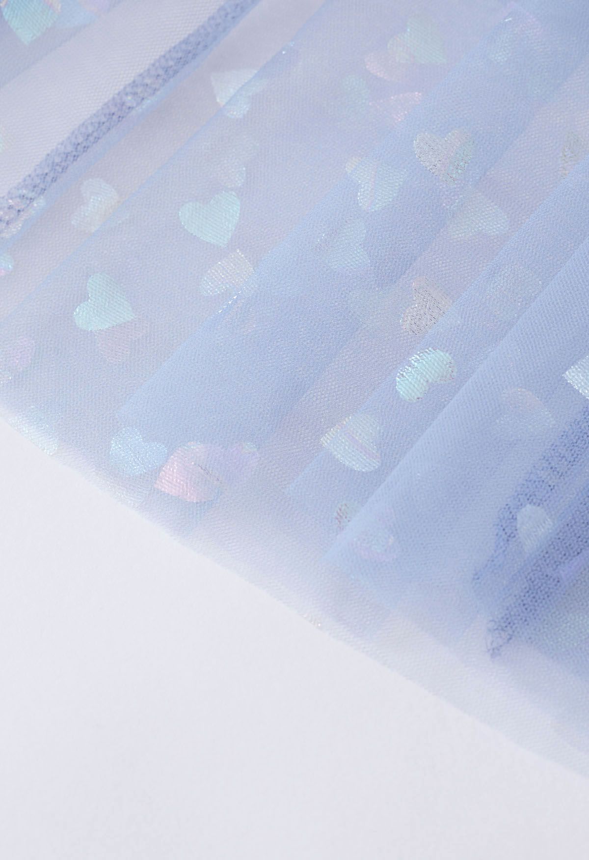 Falda midi de tul de malla con corazones iridiscentes en azul