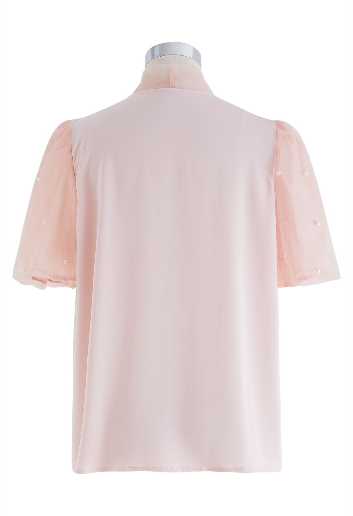 Camisa de satén empalmada con manga de malla nacarada y lazo en rosa