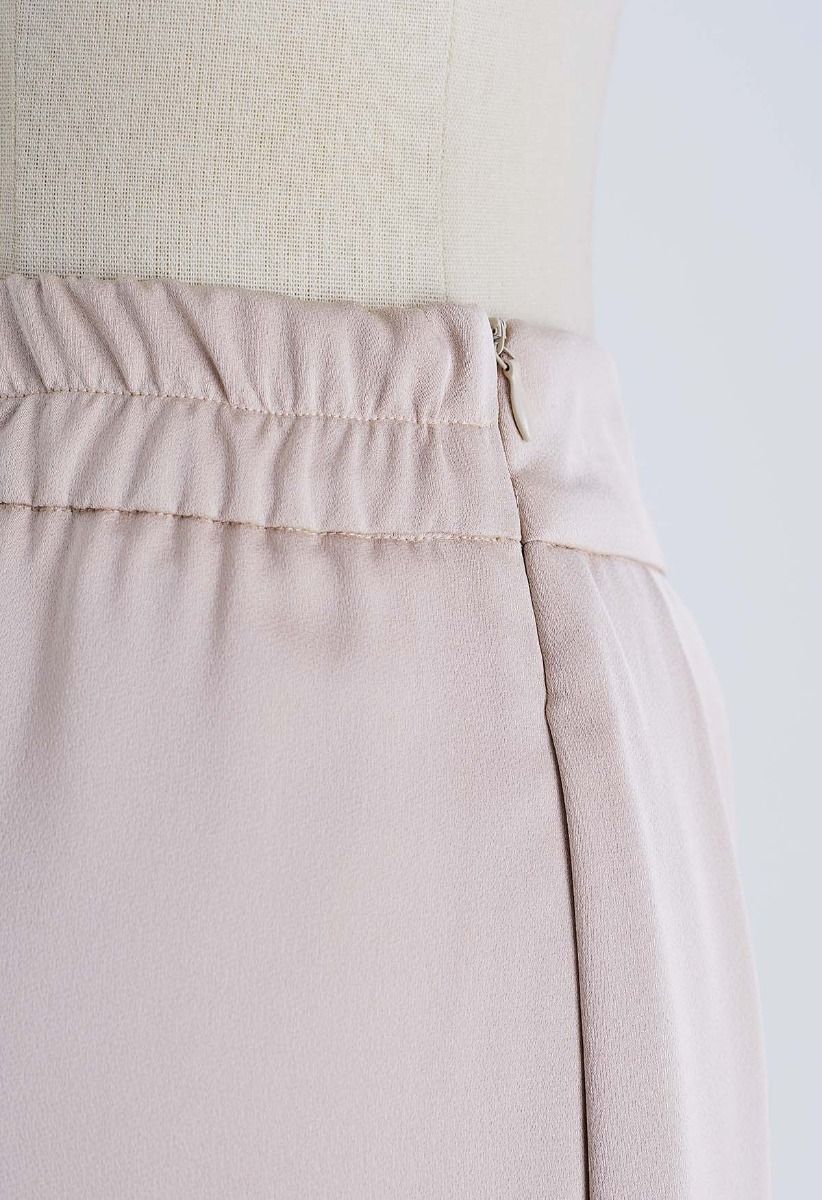 Pantalones de pernera ancha con pliegues en color rubor de Fanciful