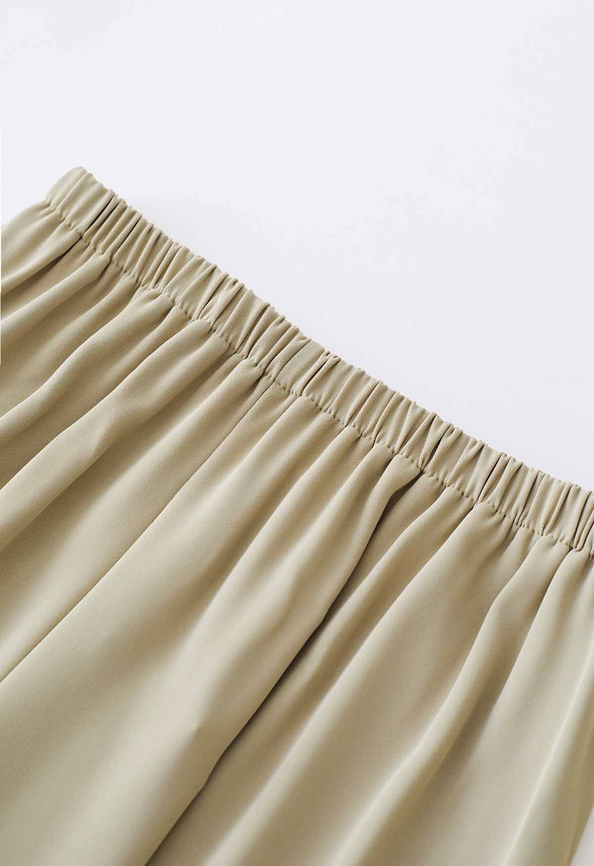 Pantalones sin cordones de satén liso en marrón claro