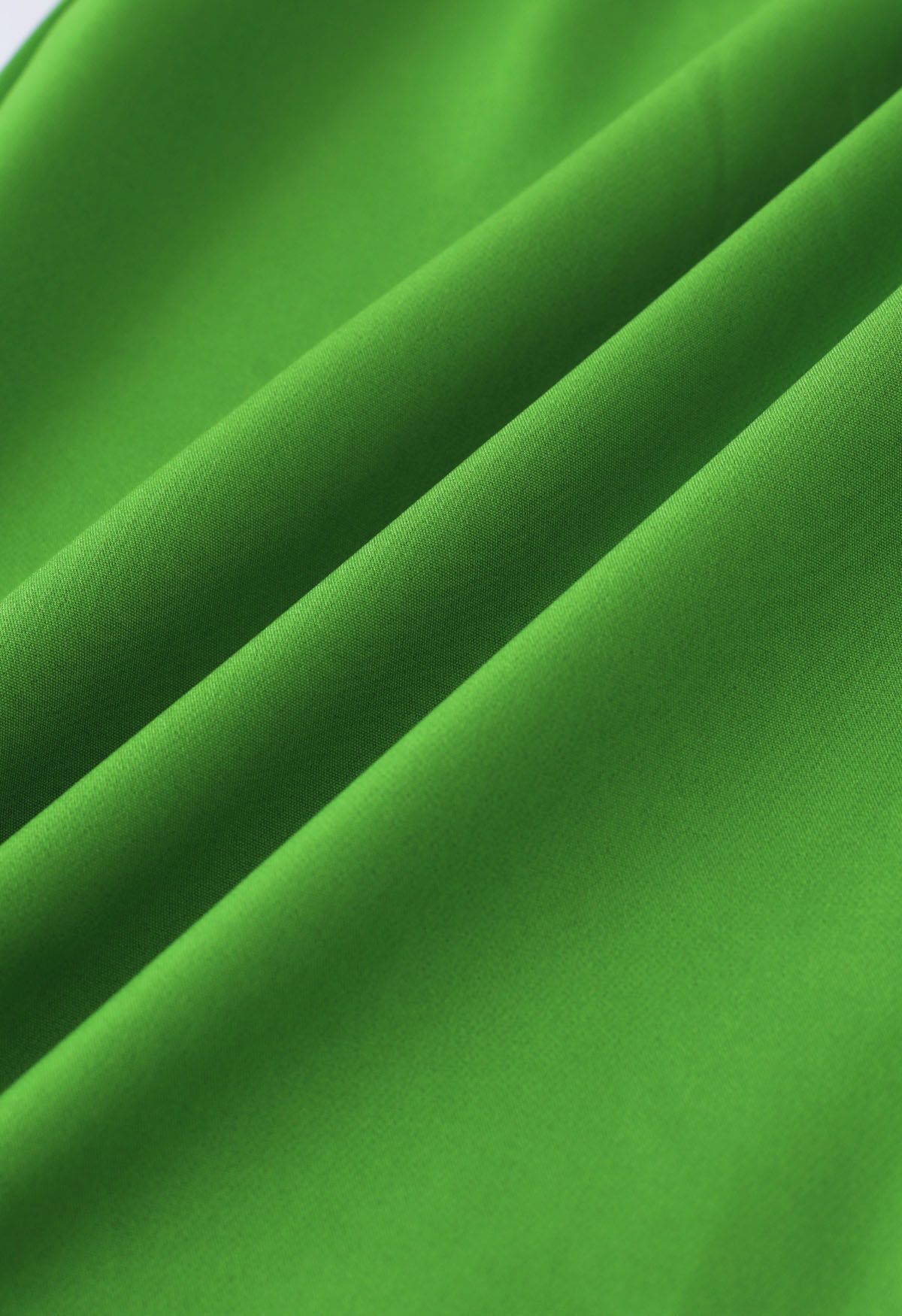 Pantalones rectos con detalle plisado verde hierba