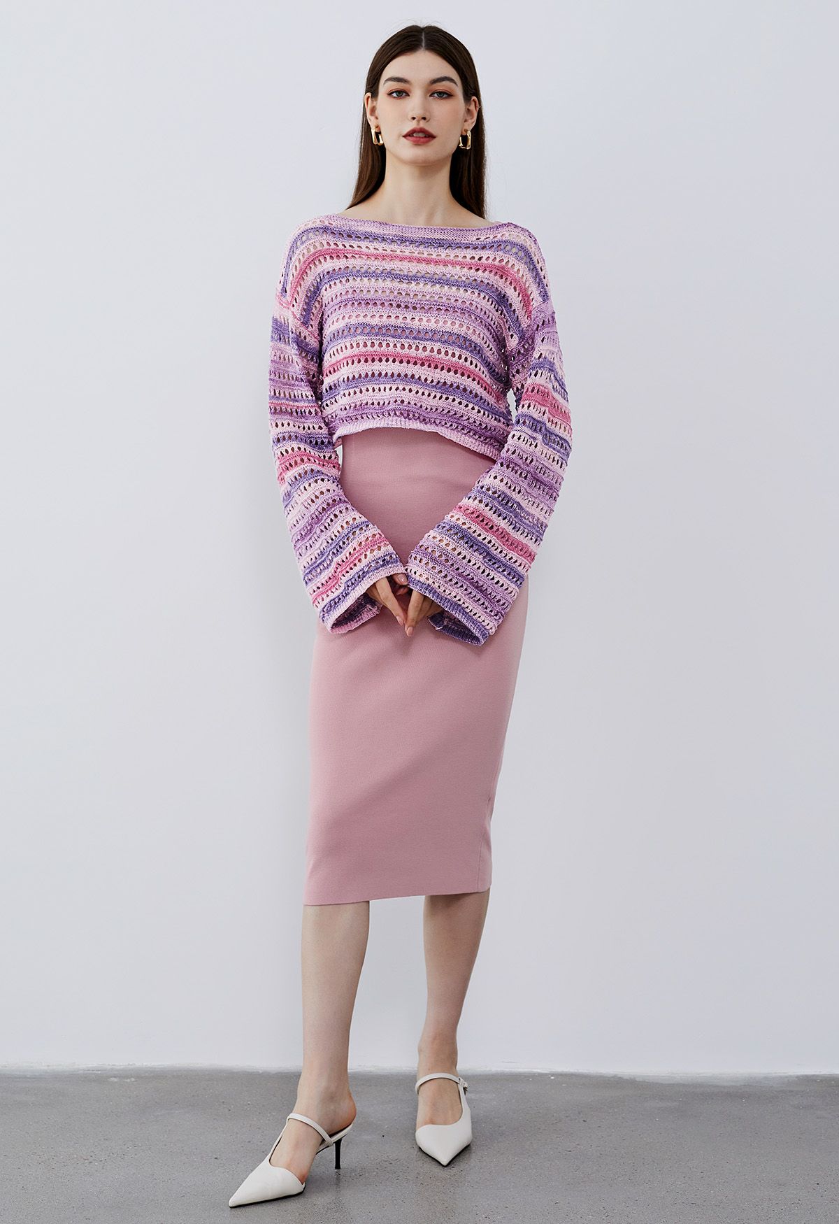 Suéter de punto calado con rayas coloridas en rosa