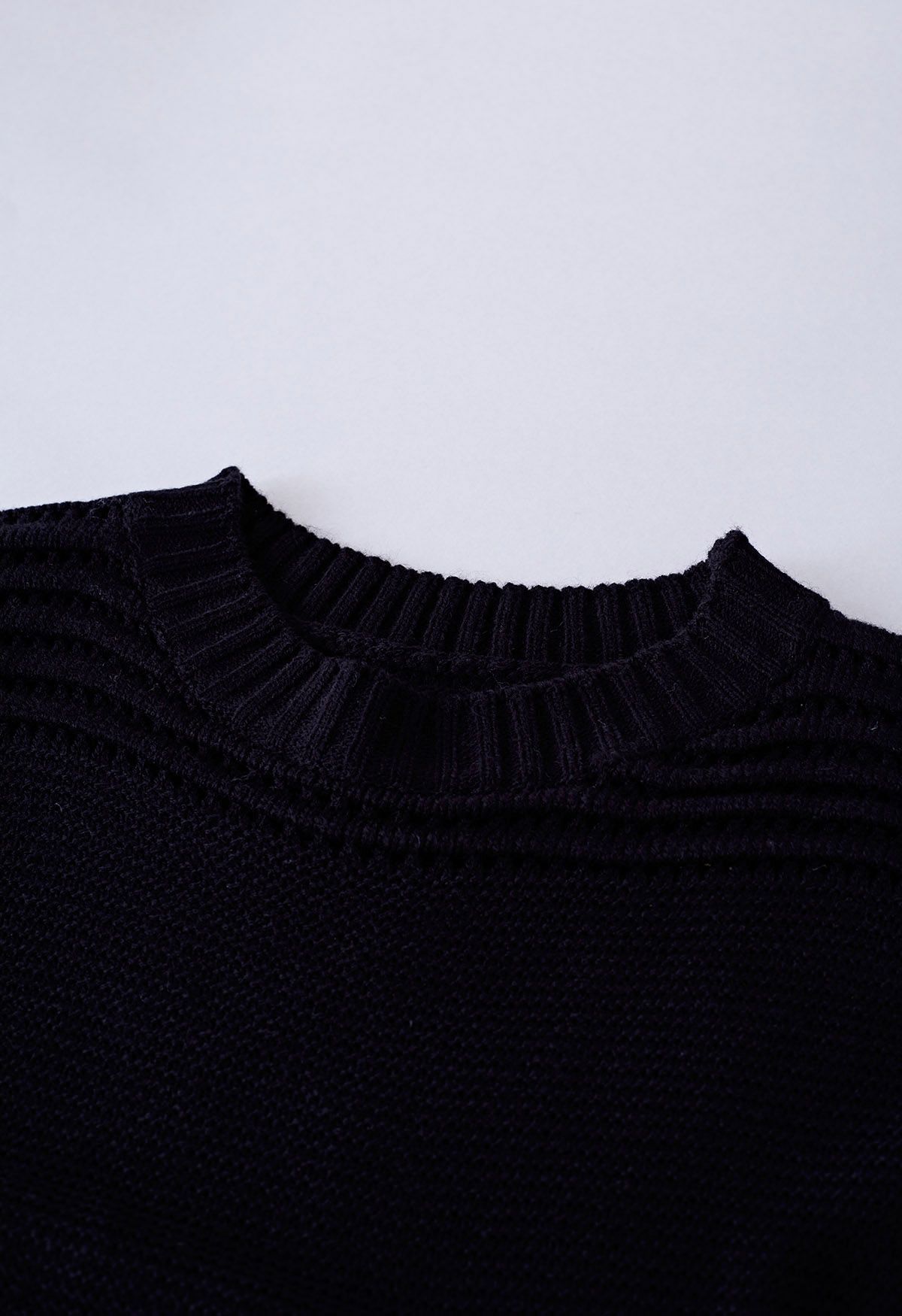 Suéter de punto calado con rayas en relieve en negro
