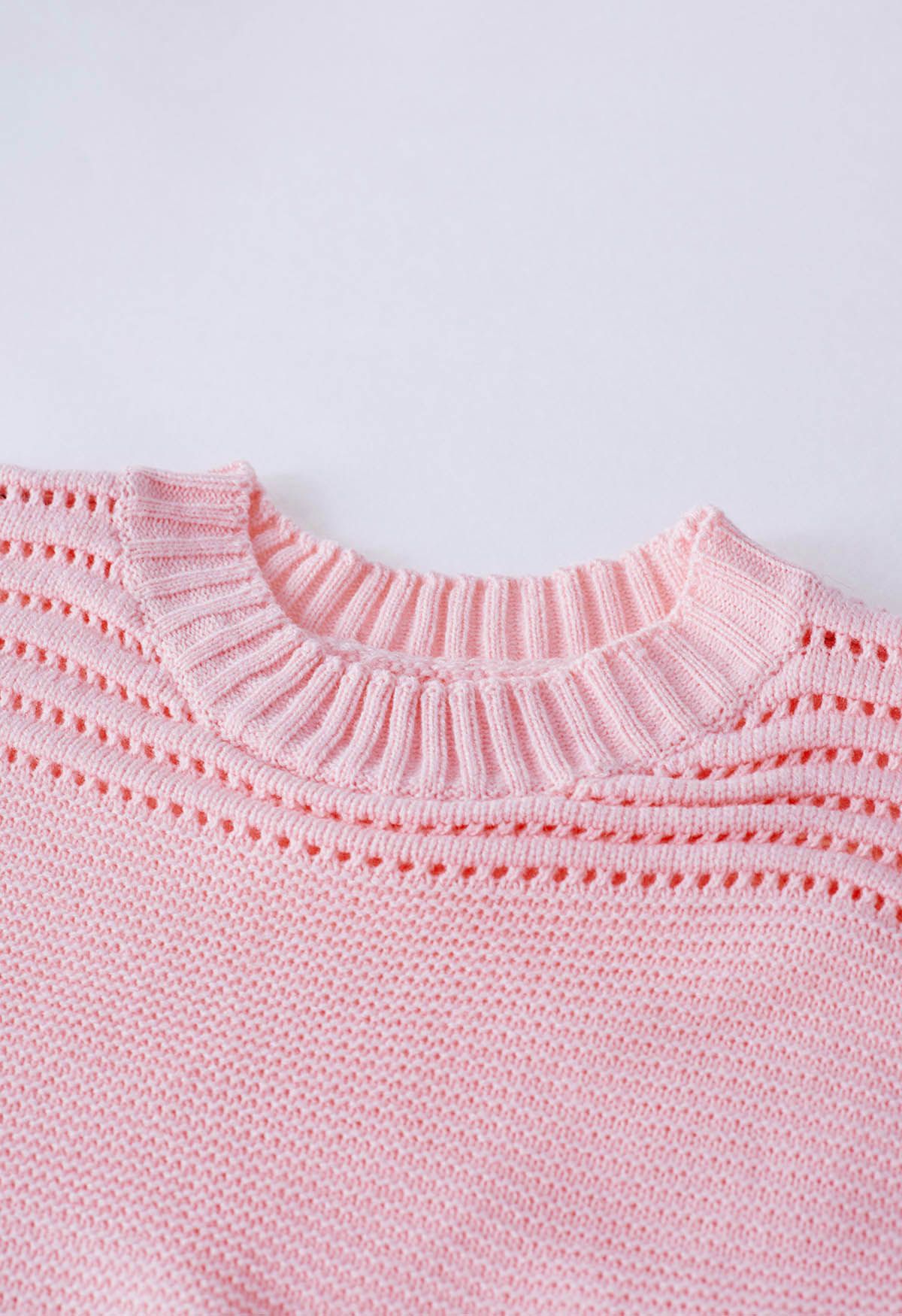 Jersey de punto calado con rayas en relieve en rosa