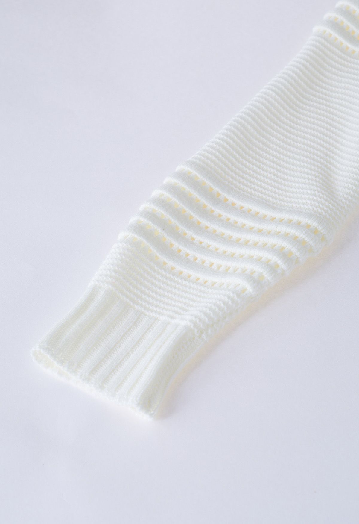 Suéter de punto calado con rayas en relieve en blanco