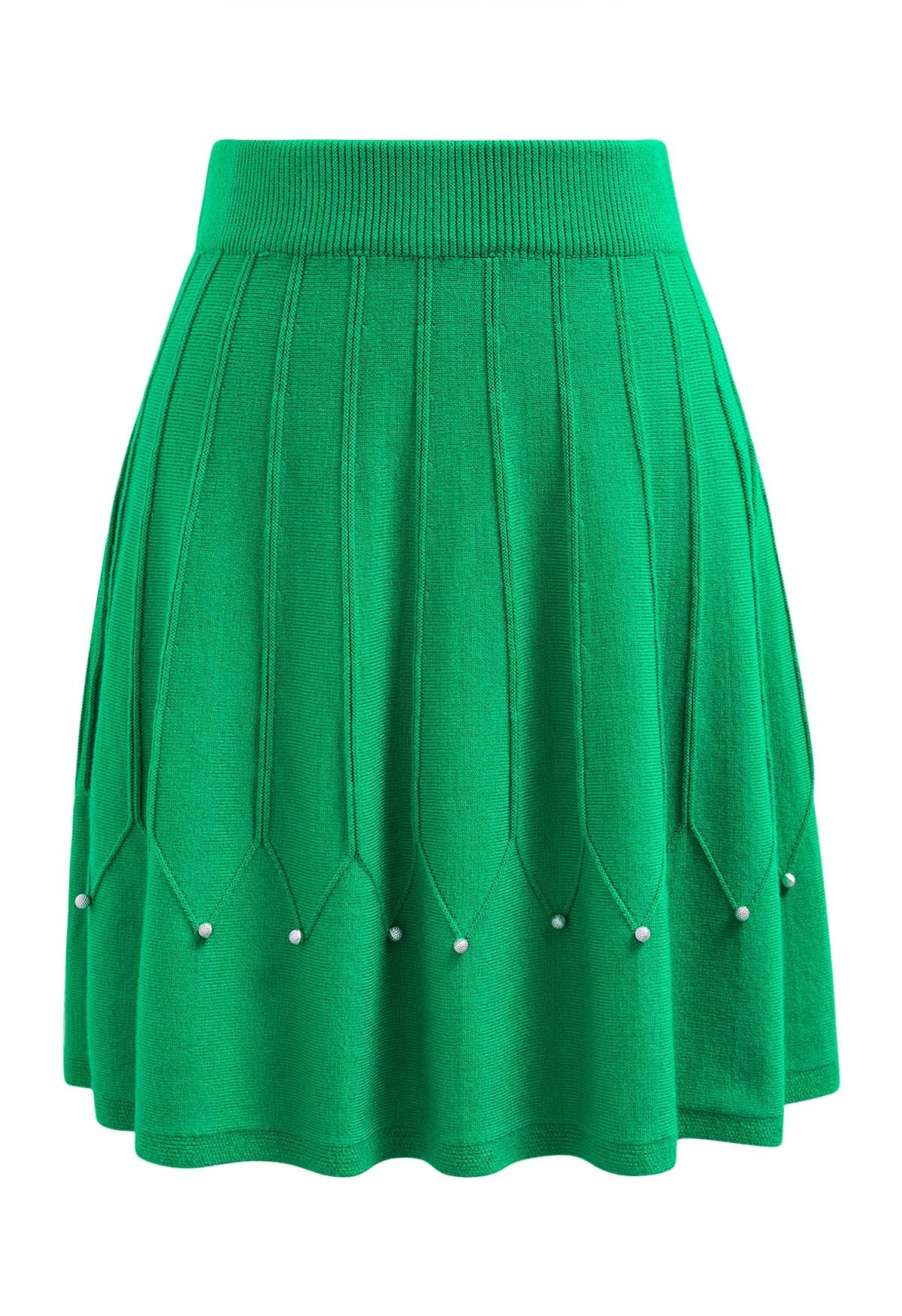 Falda de punto con costuras adornadas con cuentas plateadas en verde