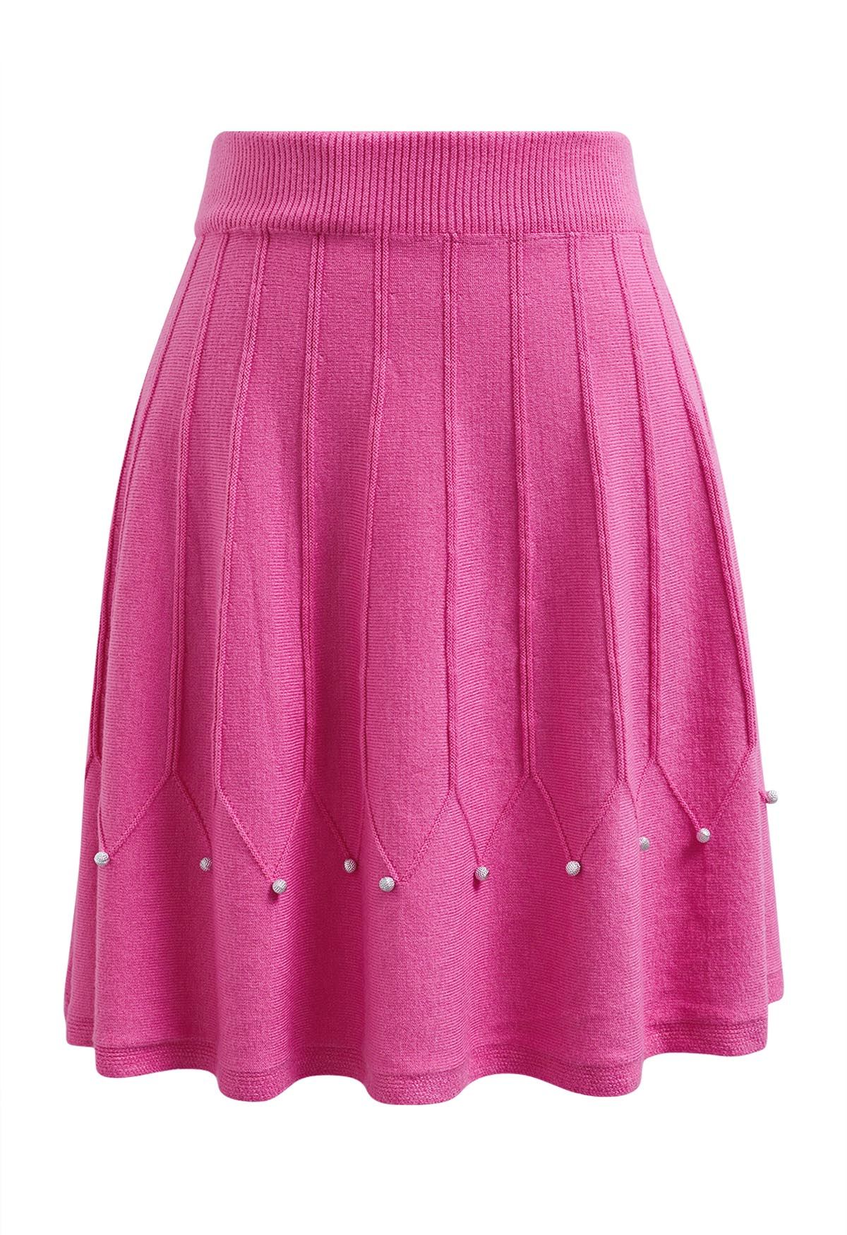 Falda de punto con costuras adornadas con cuentas plateadas en color magenta
