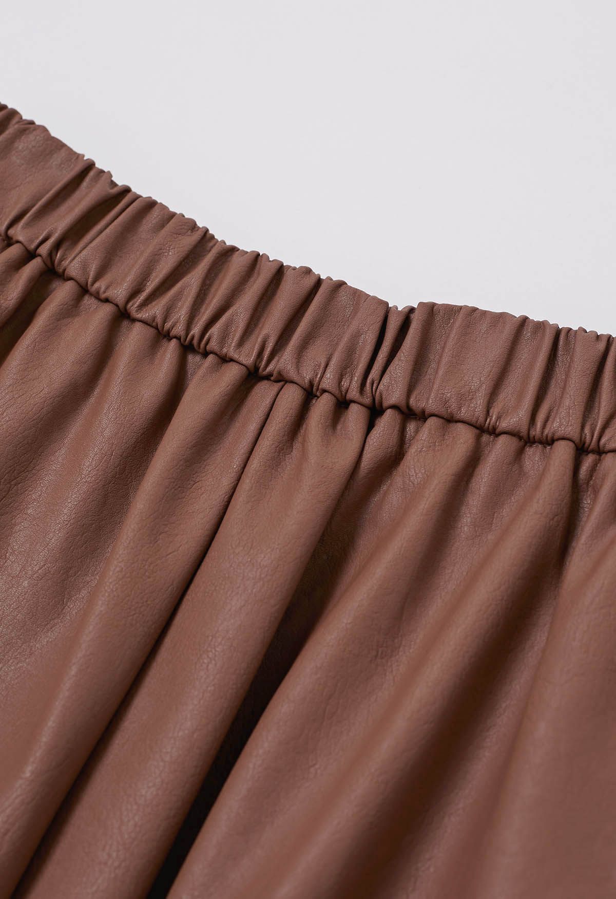 Falda midi plisada de piel sintética en color óxido