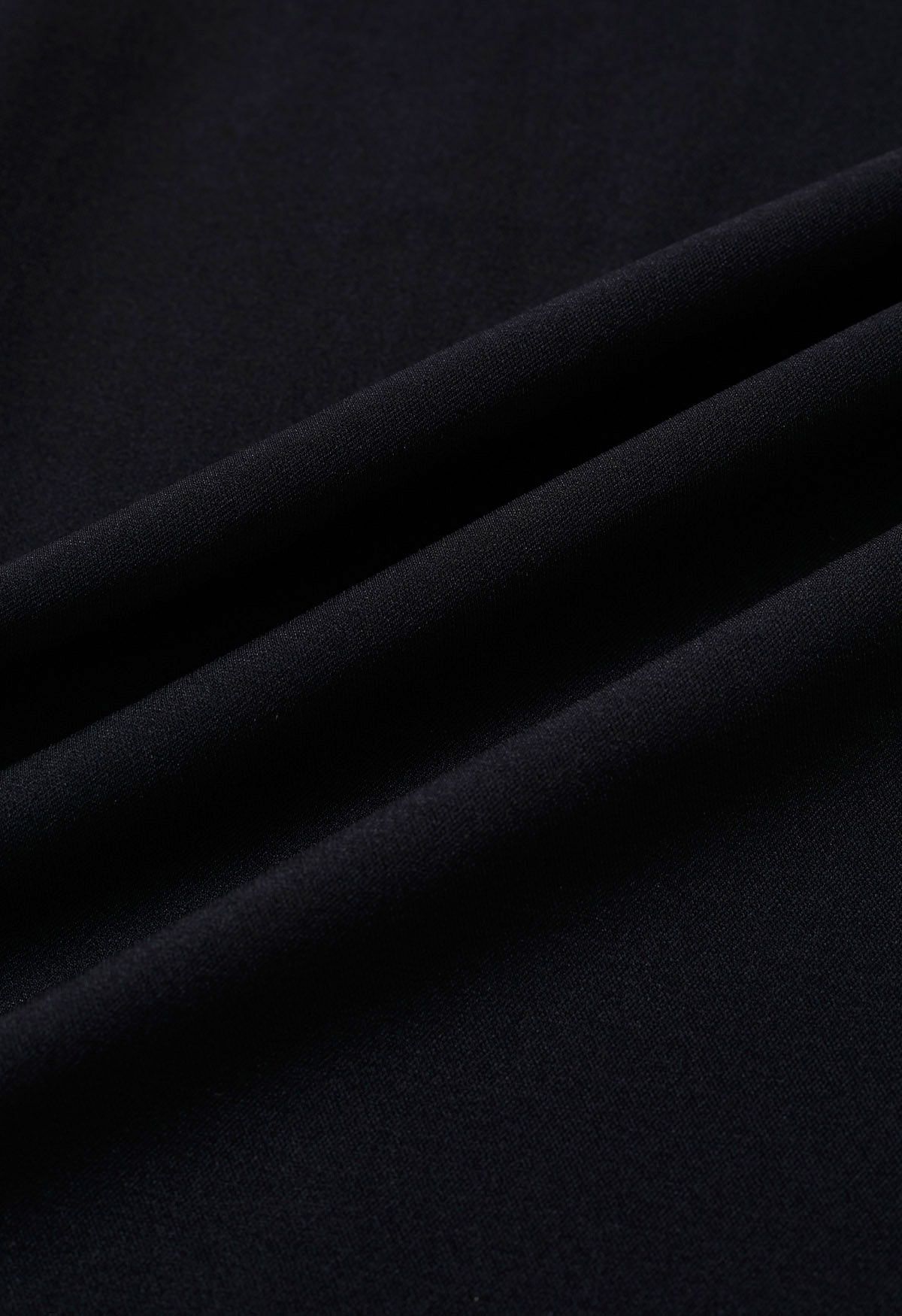 Pantalones anchos plisados de cintura alta fruncidos en negro