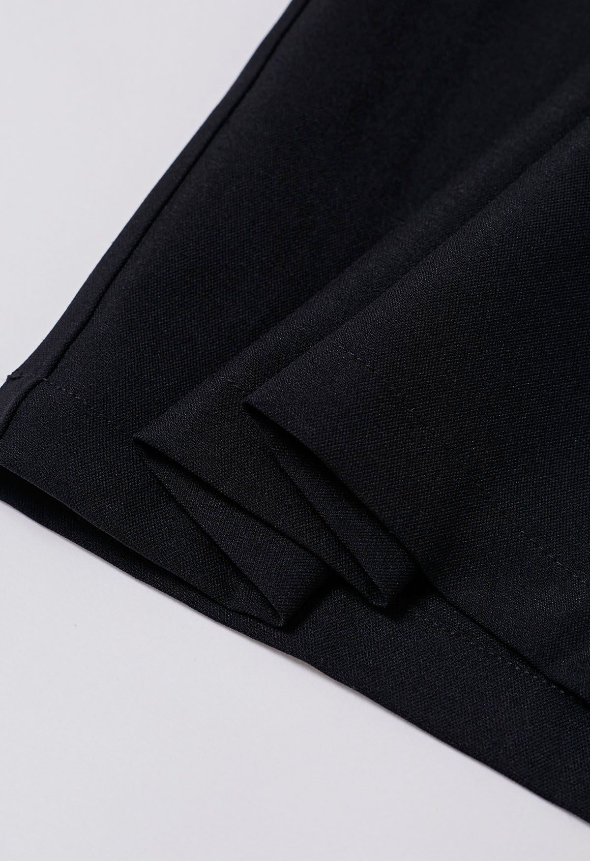 Pantalones anchos plisados de cintura alta fruncidos en negro