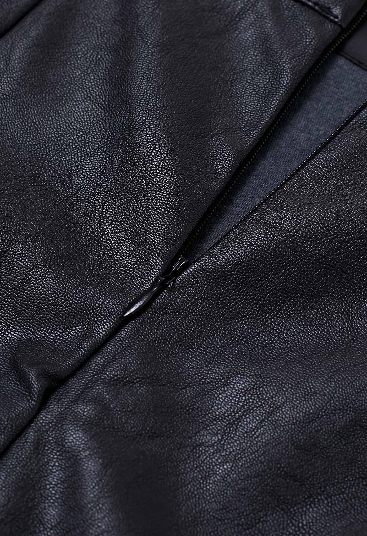 Minifalda de piel sintética con dobladillo irregular en negro
