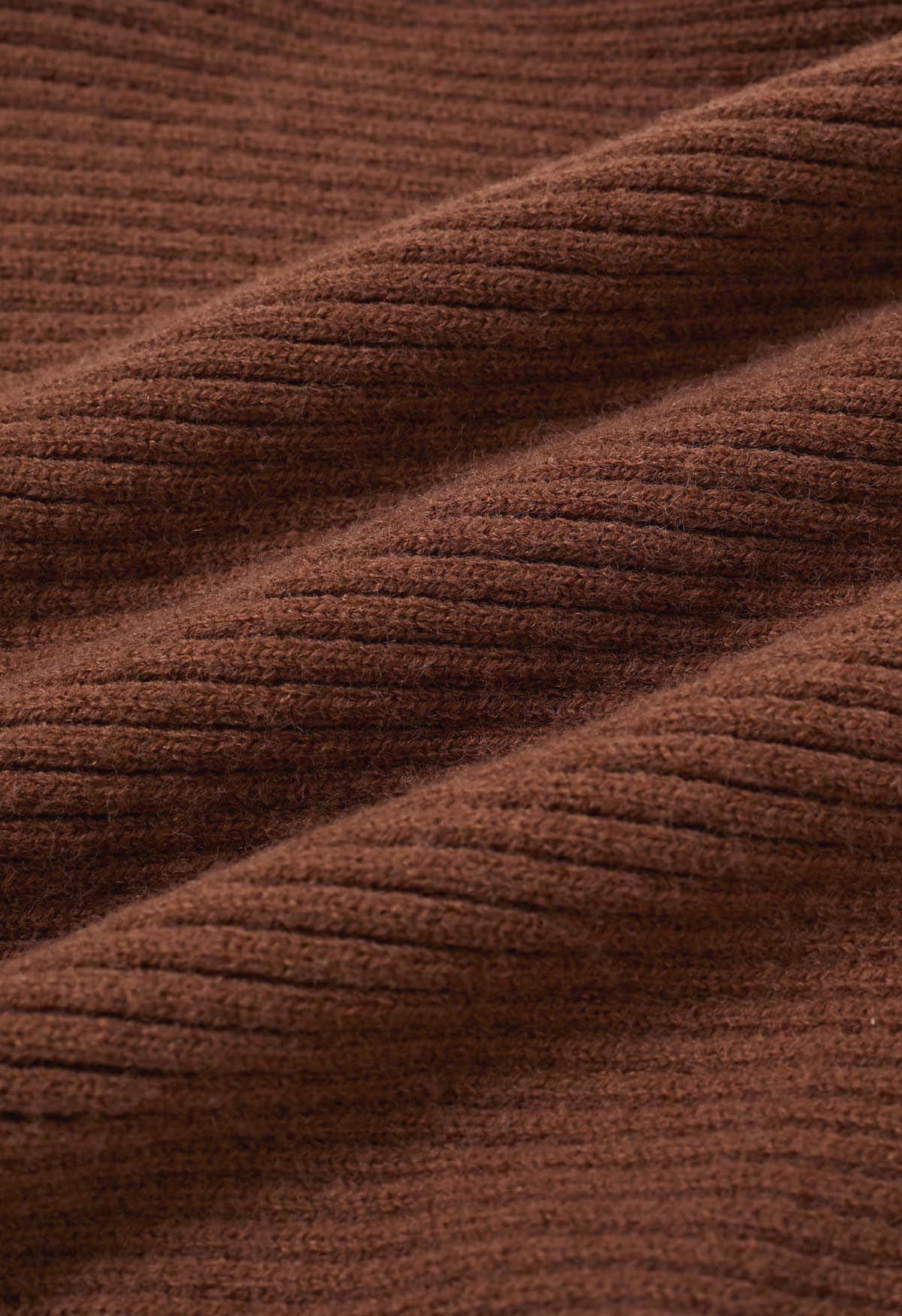 Impresionante suéter de punto acanalado con mangas de murciélago en color caramelo