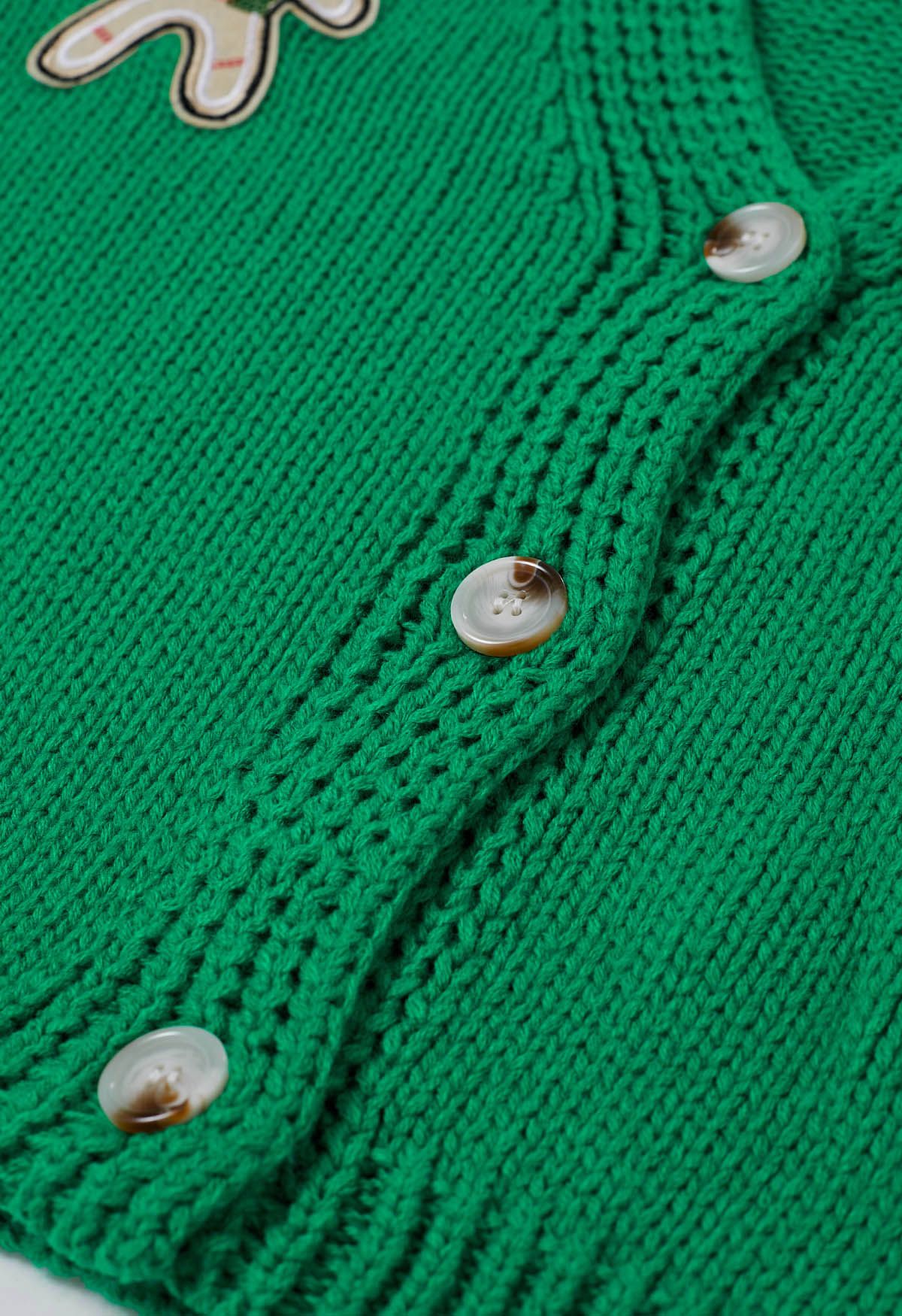 Cárdigan de punto de hombre de jengibre con lentejuelas y calcetín navideño en verde