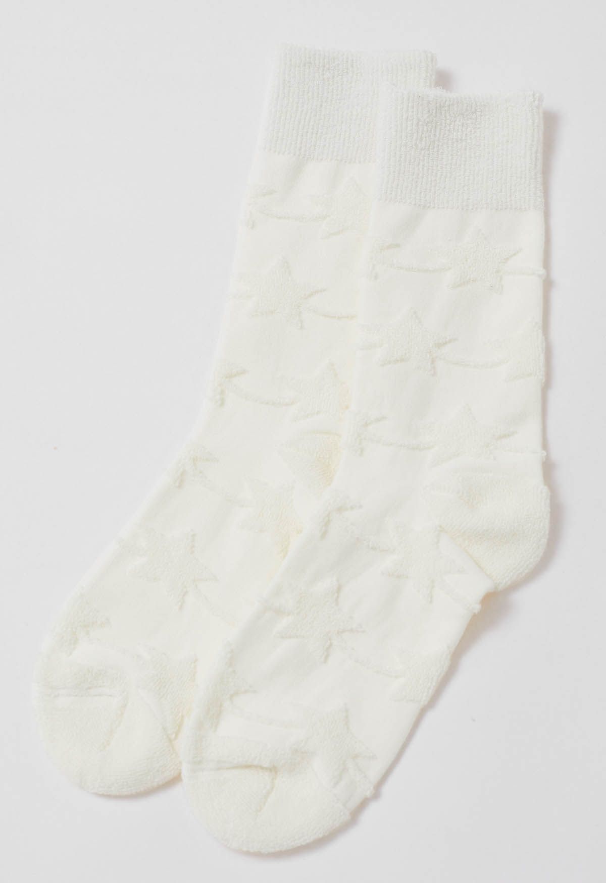 Calcetines de media pantorrilla con relieve navideño en blanco