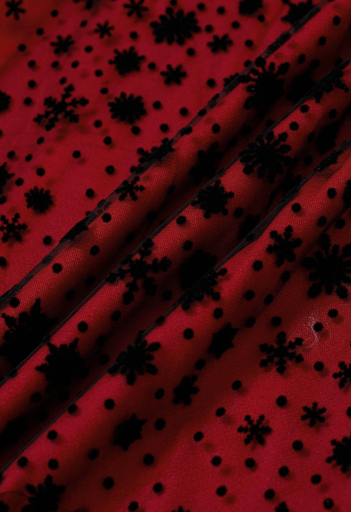 Falda midi de tul y malla con copos de nieve de terciopelo en rojo
