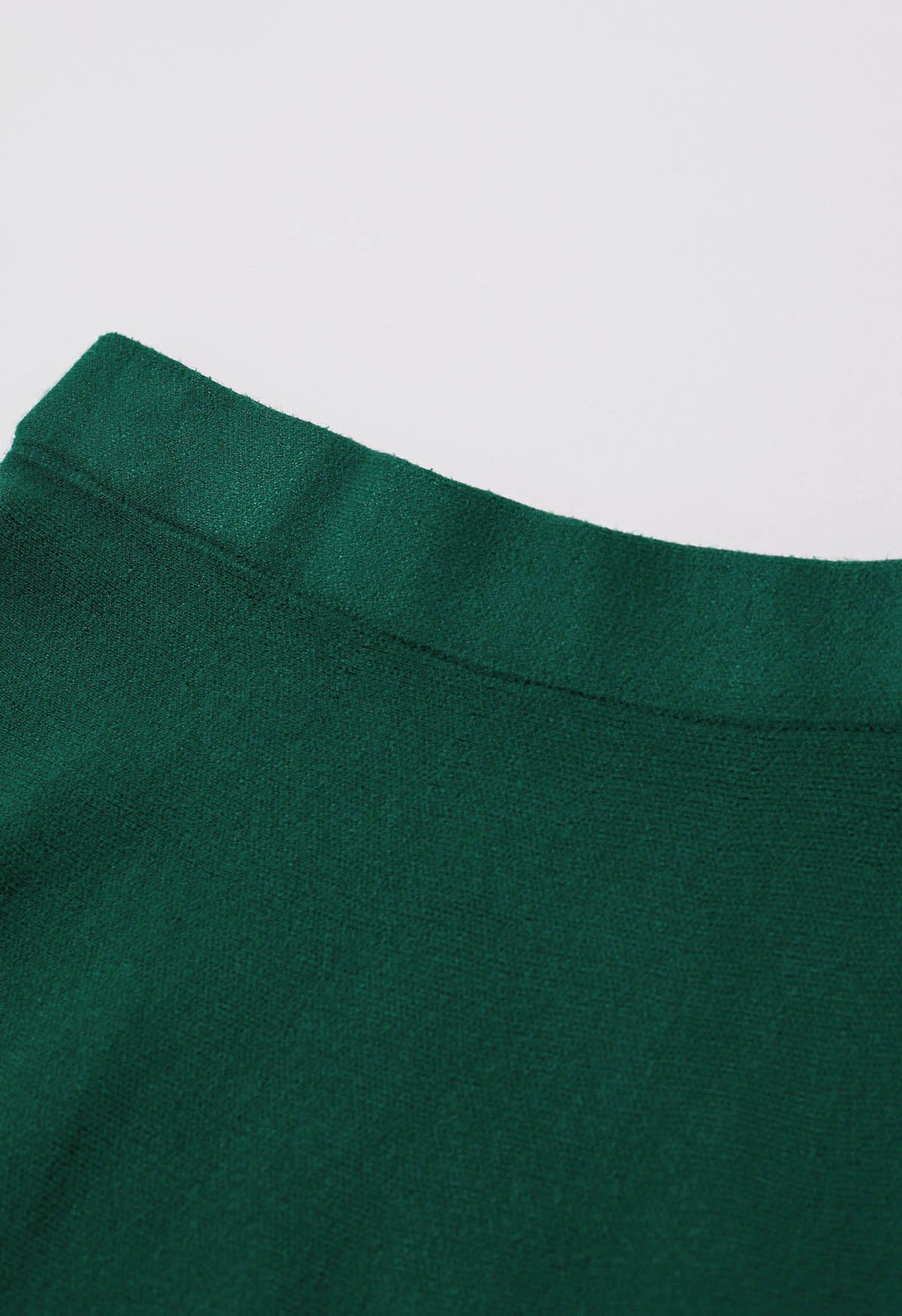 Falda midi de punto acampanada de color liso en verde oscuro