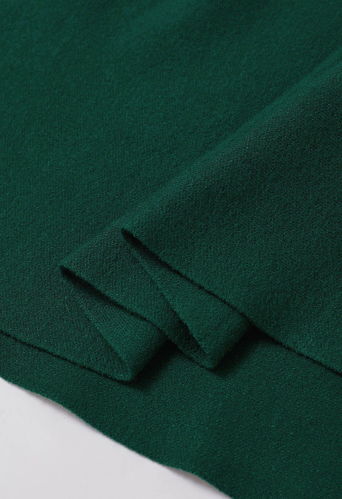 Falda midi de punto acampanada de color liso en verde oscuro