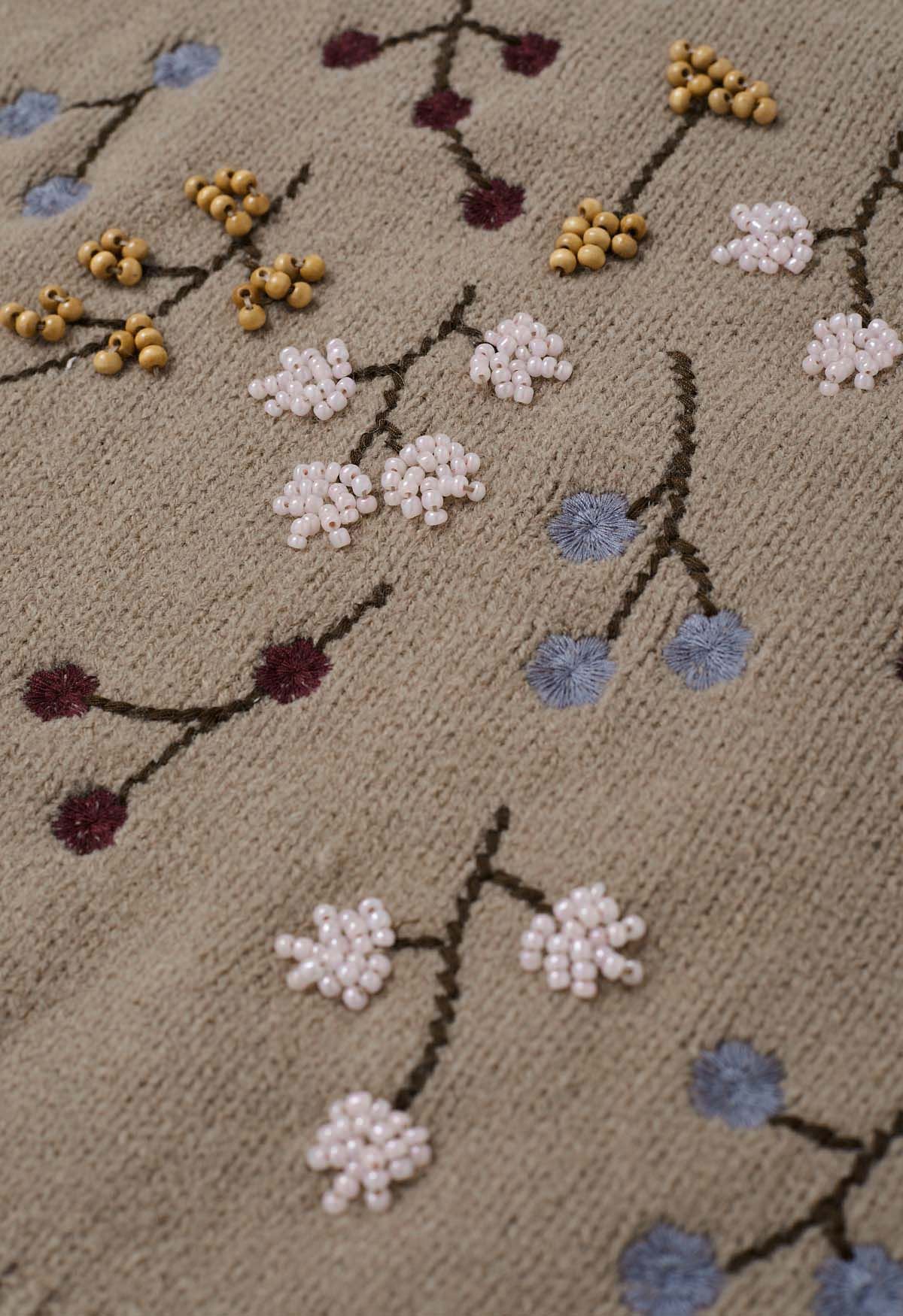 Suéter corto floral bordado con cuentas