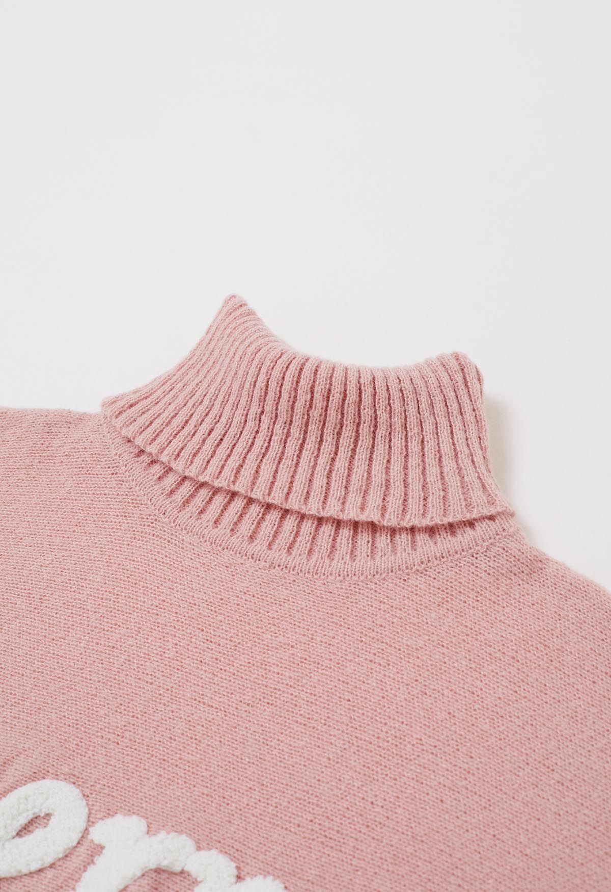Suéter de punto con manga de murciélago y cuello alto alegre en rosa