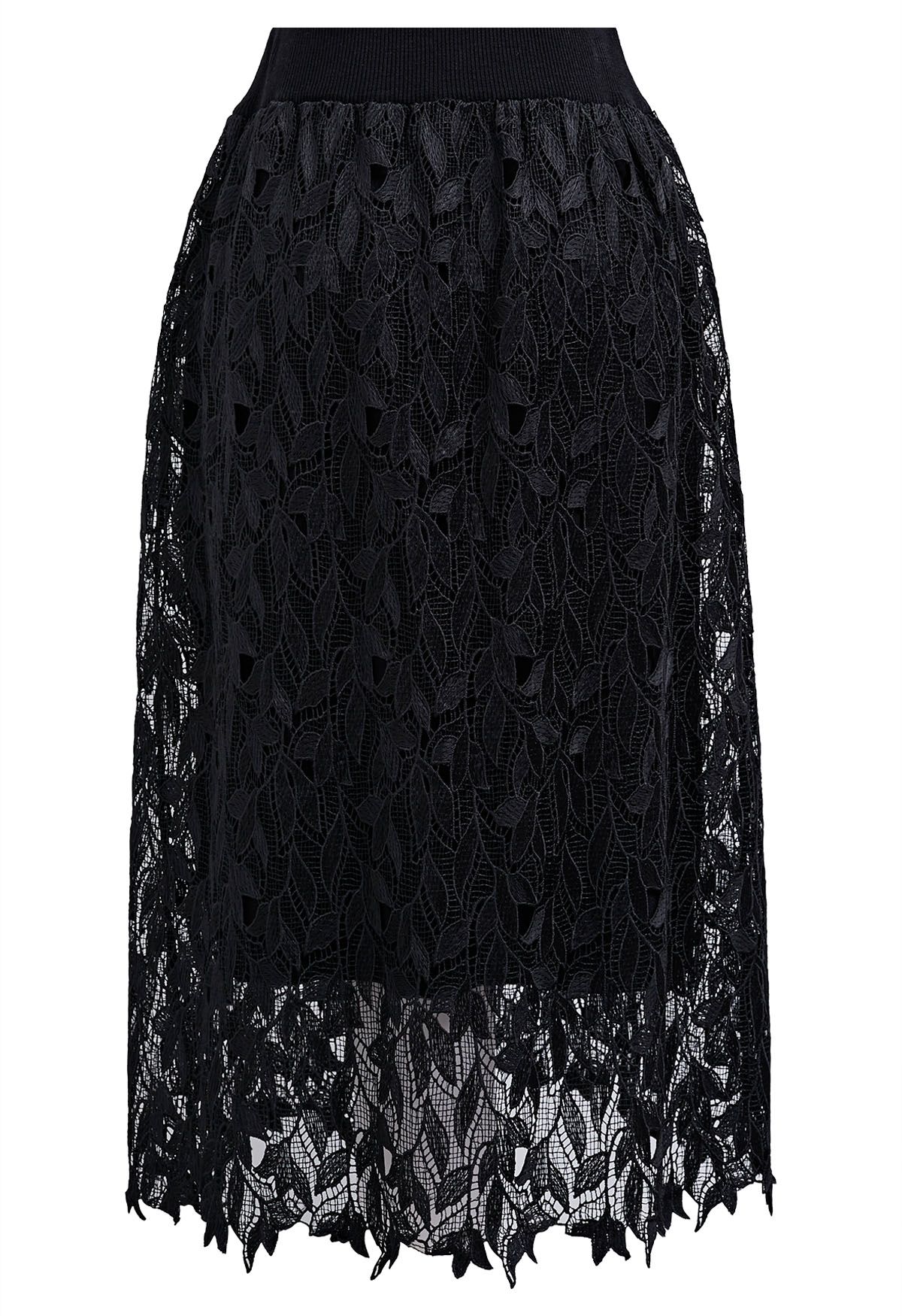 Falda midi de punto con superposición de encaje calado en negro