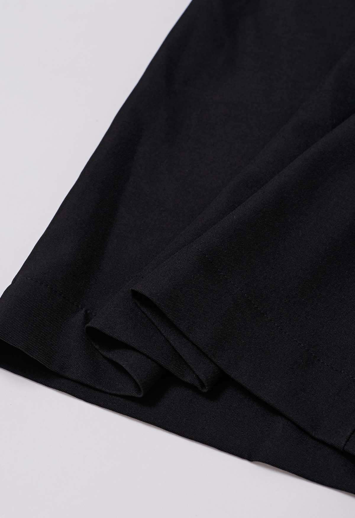 Pantalones anchos plisados con cintura anudada de moda en negro
