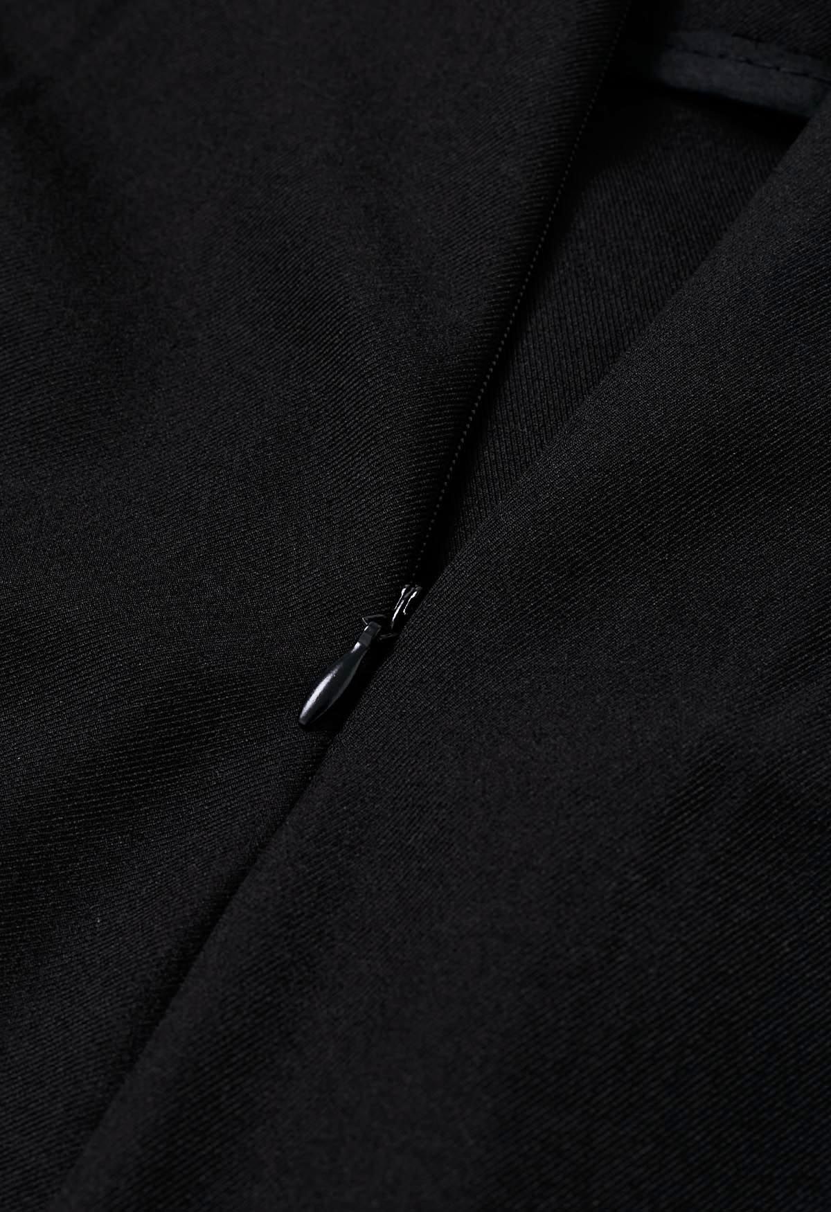 Pantalones anchos plisados con cintura anudada de moda en negro