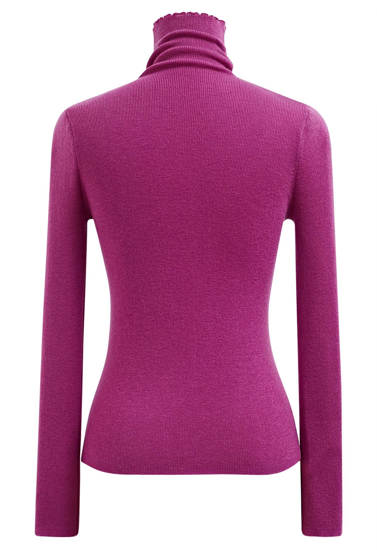 Top básico de punto suave con cuello alto en magenta