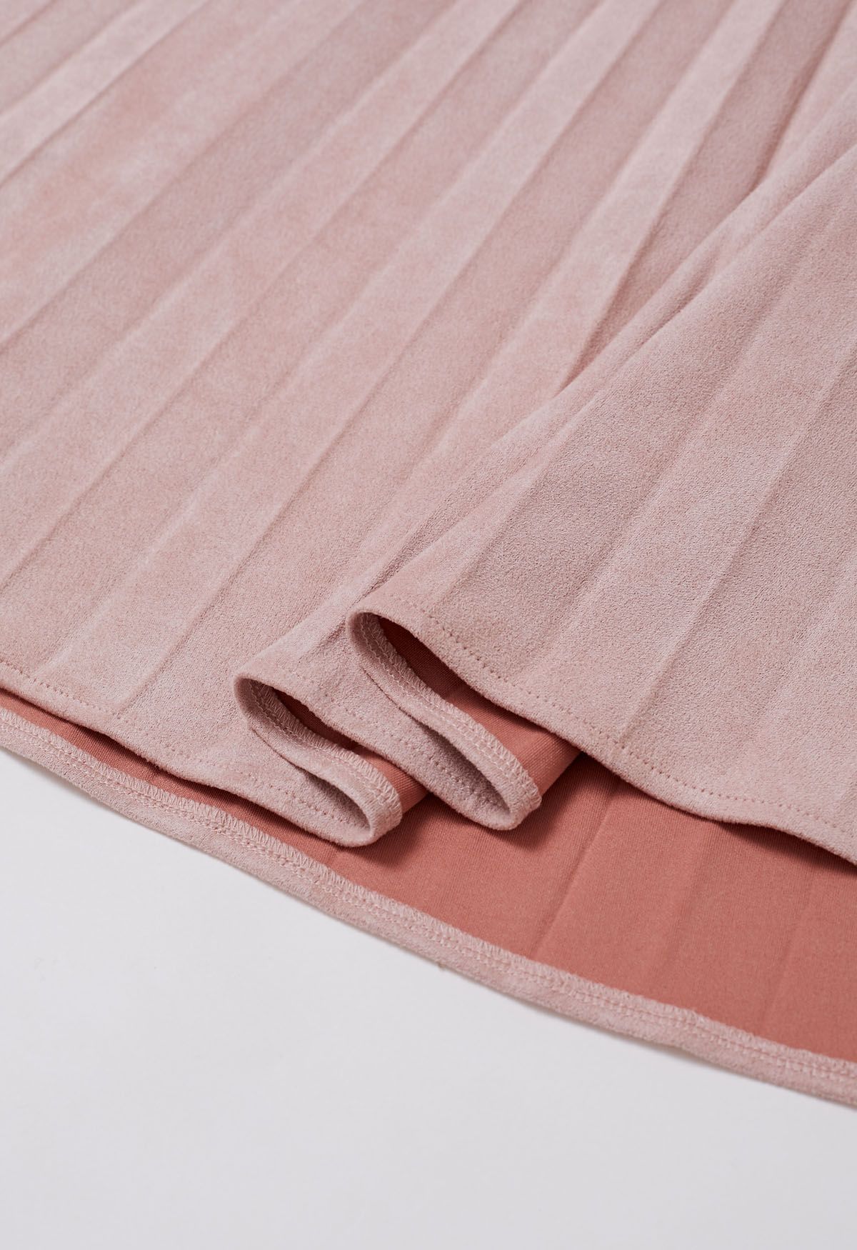 Falda midi plisada de ante sintético liso en rosa