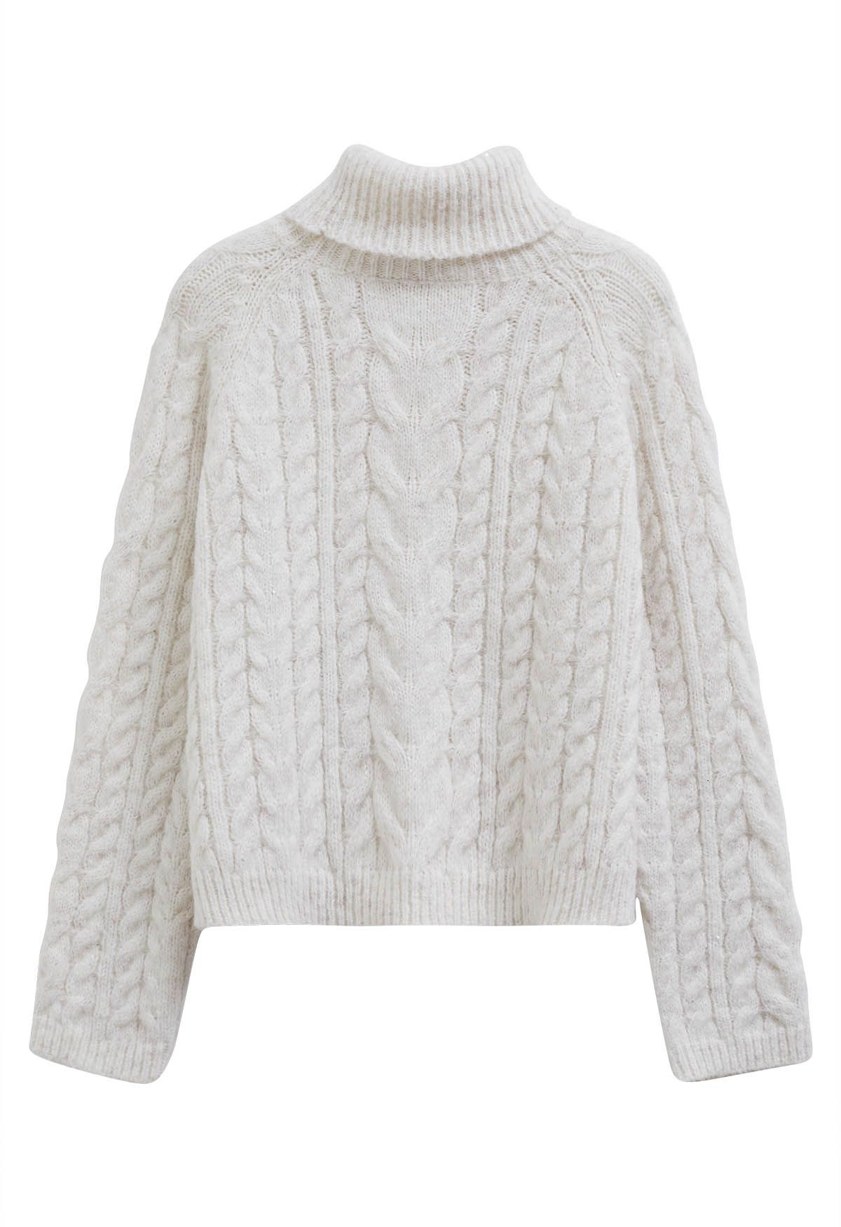 Suéter de punto de cable con lentejuelas y cuello alto en blanco