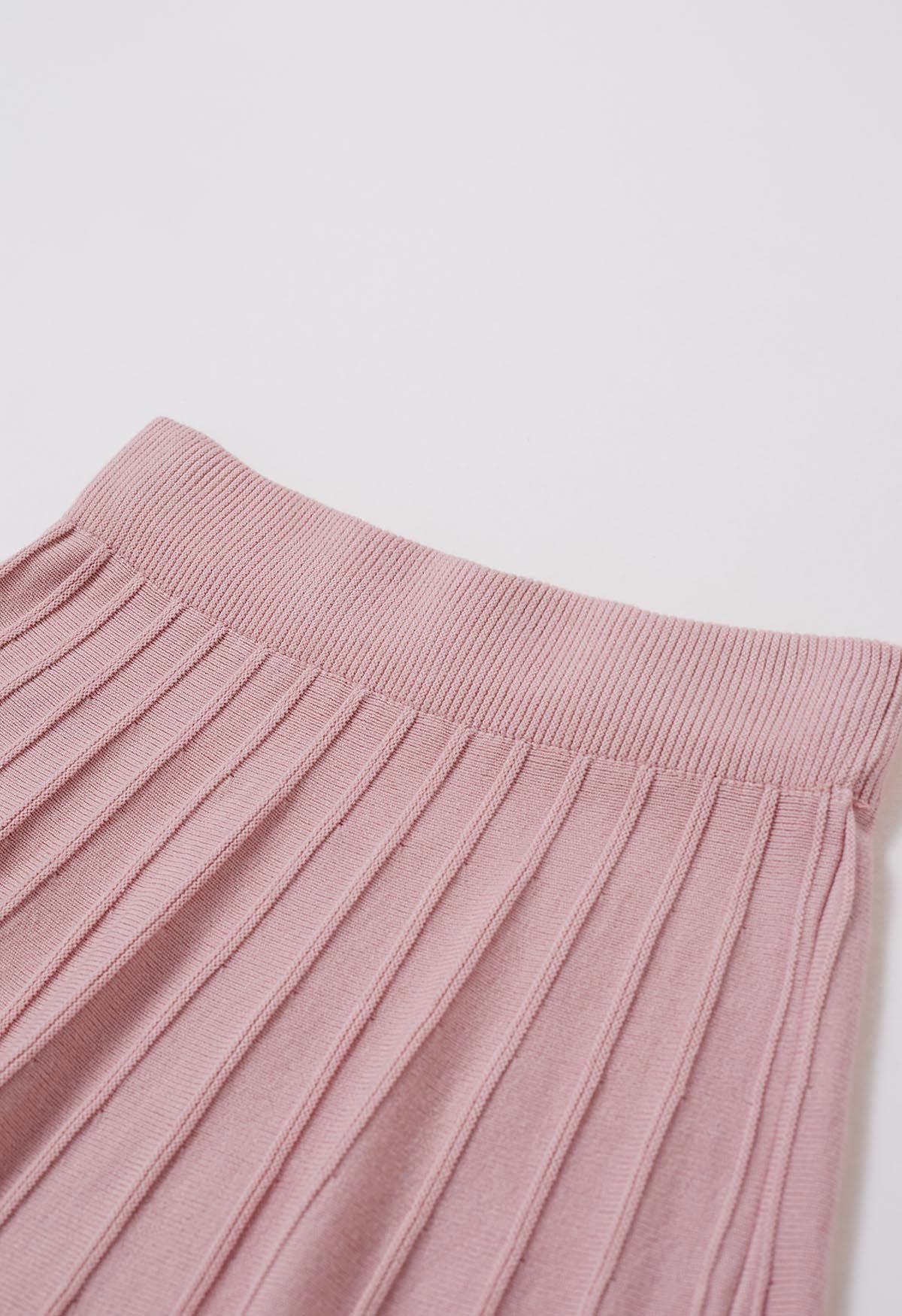 Falda midi de punto con costuras adornadas con cuentas plateadas en rosa
