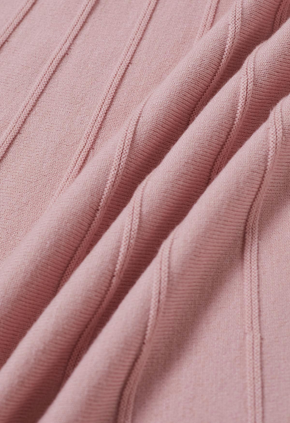 Falda midi de punto con costuras adornadas con cuentas plateadas en rosa