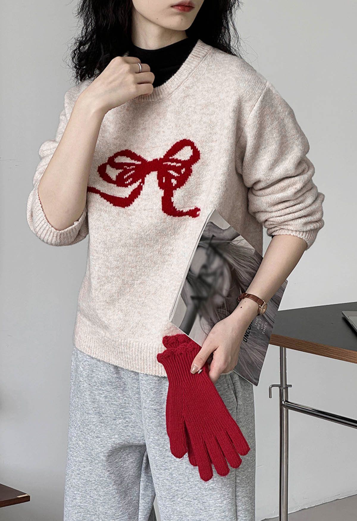 Suéter de punto con borde acanalado y patrón de cinta con lazo