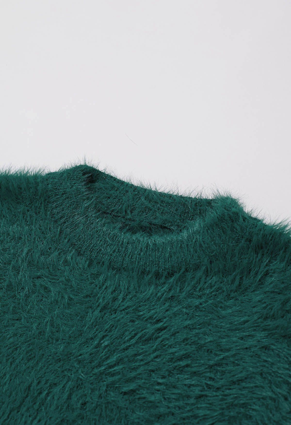 Suéter de punto borroso de color liso en verde