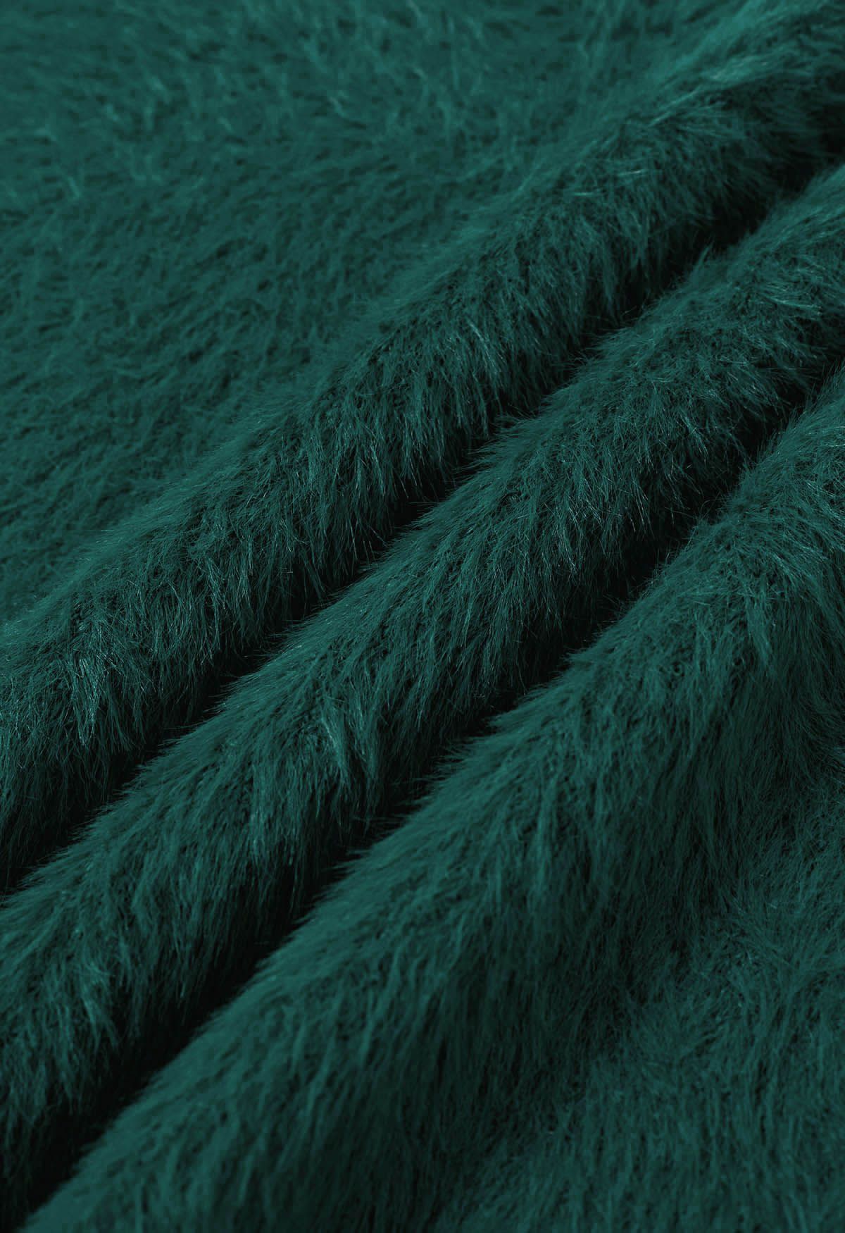 Suéter de punto borroso de color liso en verde