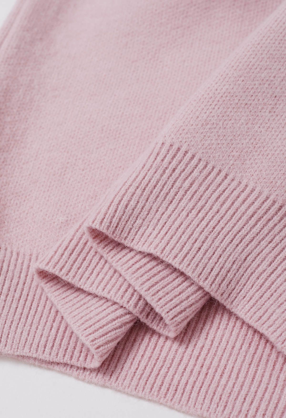 Suéter de punto con estampado de flores en contraste en rosa