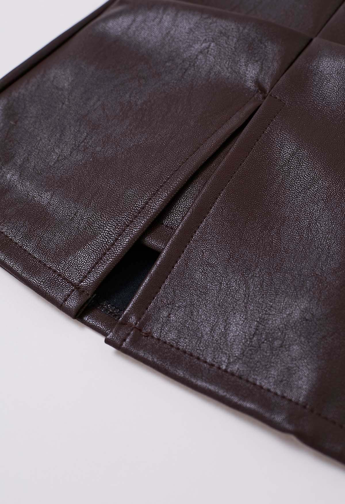 Minifalda con detalle de pliegues de piel sintética en marrón