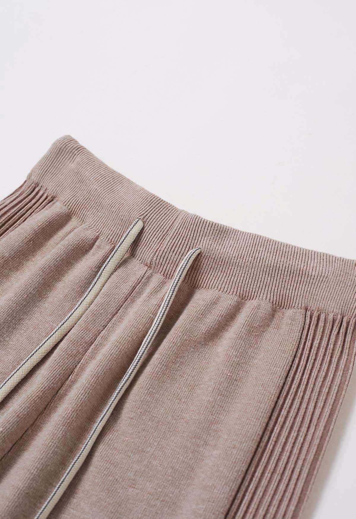 Pantalones de punto con cintura con cordón y detalle de canalé en color avena