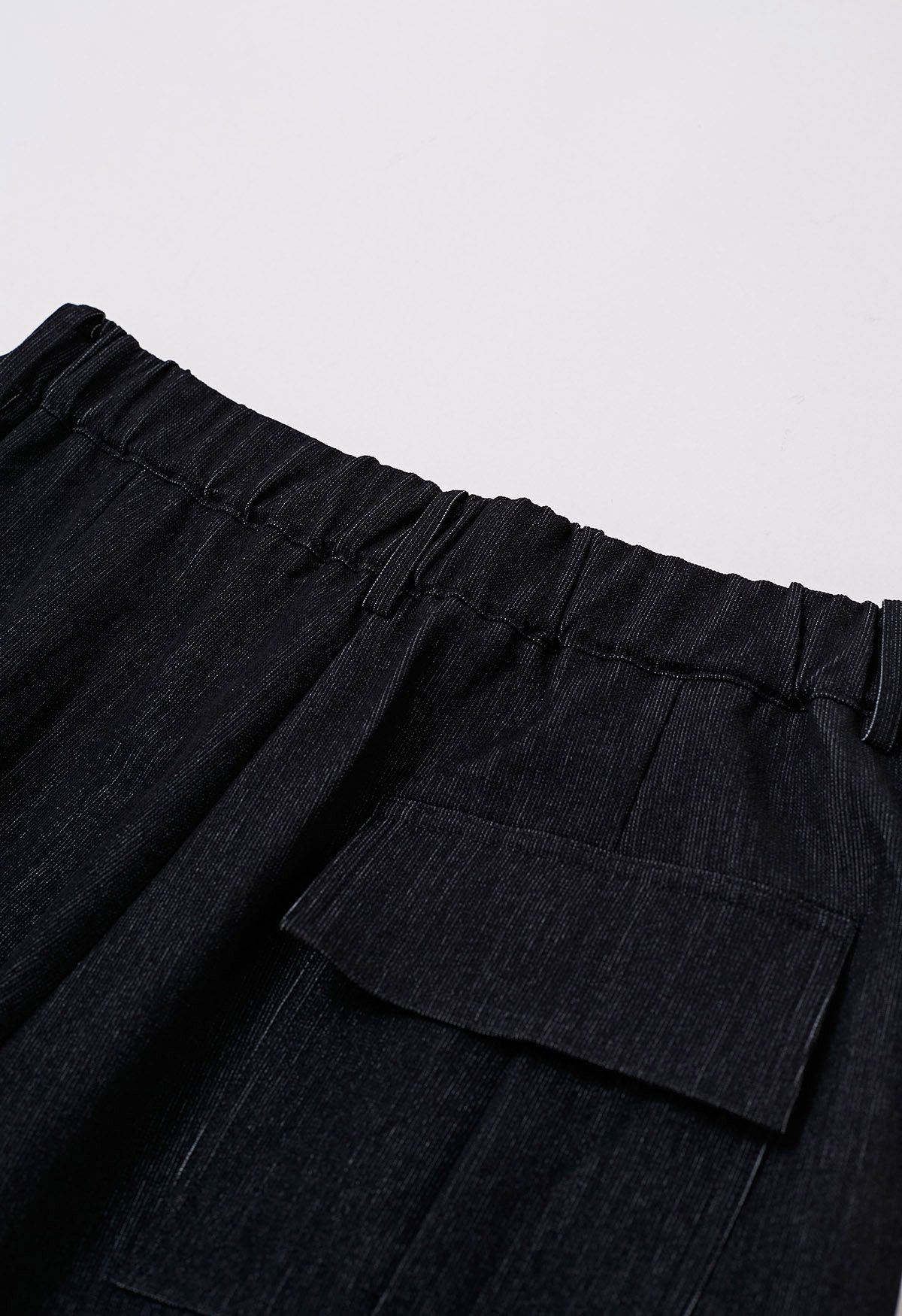 Pantalones anchos plisados cómodos a medida en negro