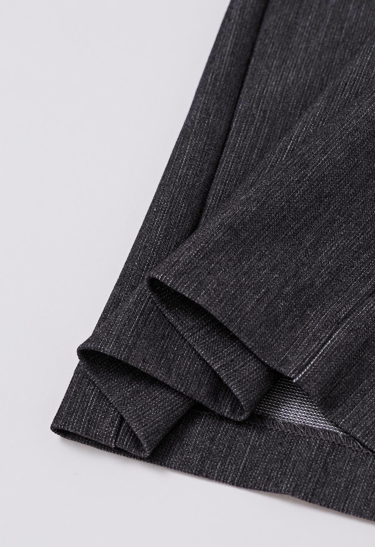 Pantalones anchos plisados cómodos a medida en gris