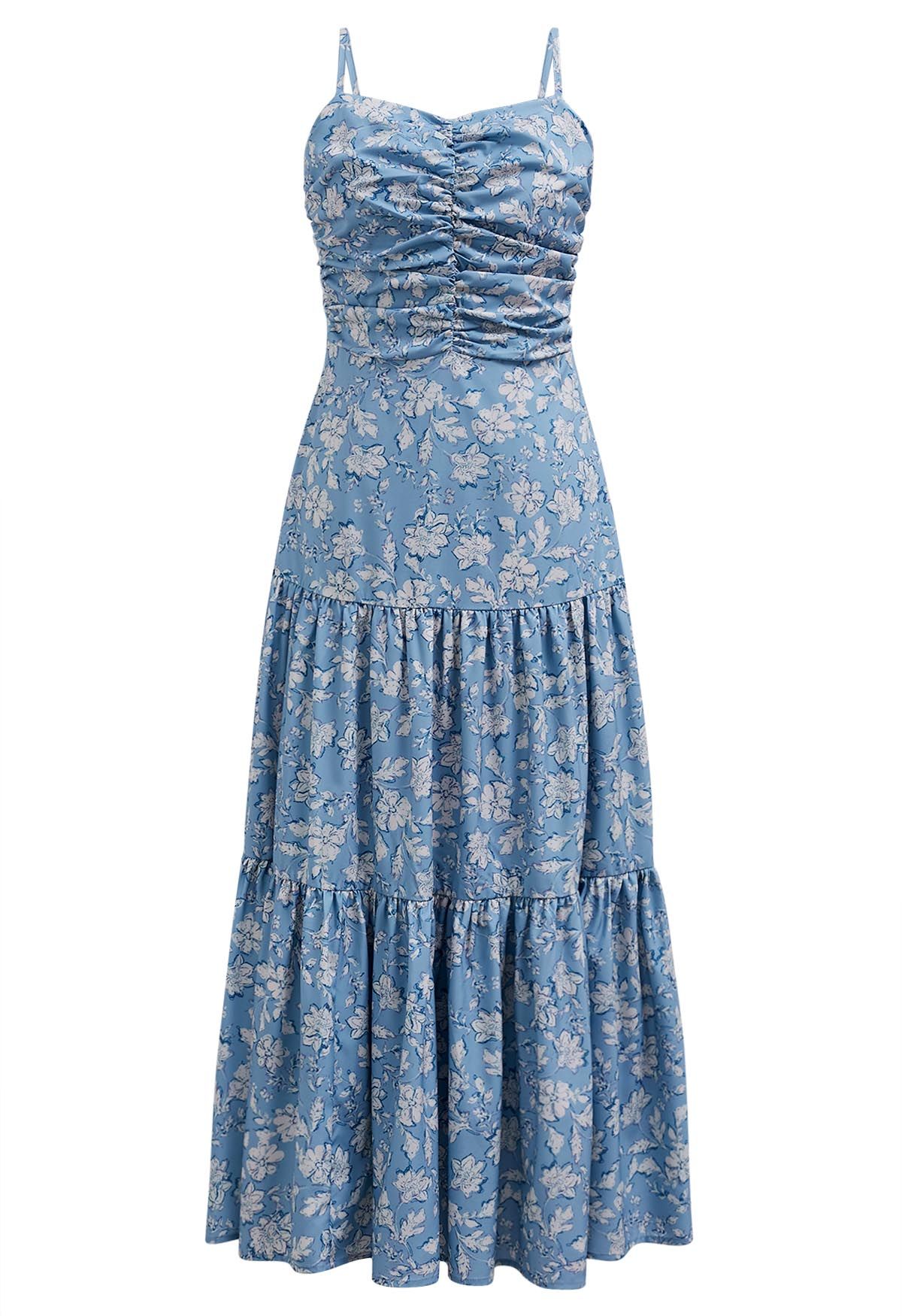 Vestido camisero con estampado floral y espalda con lazo en azul