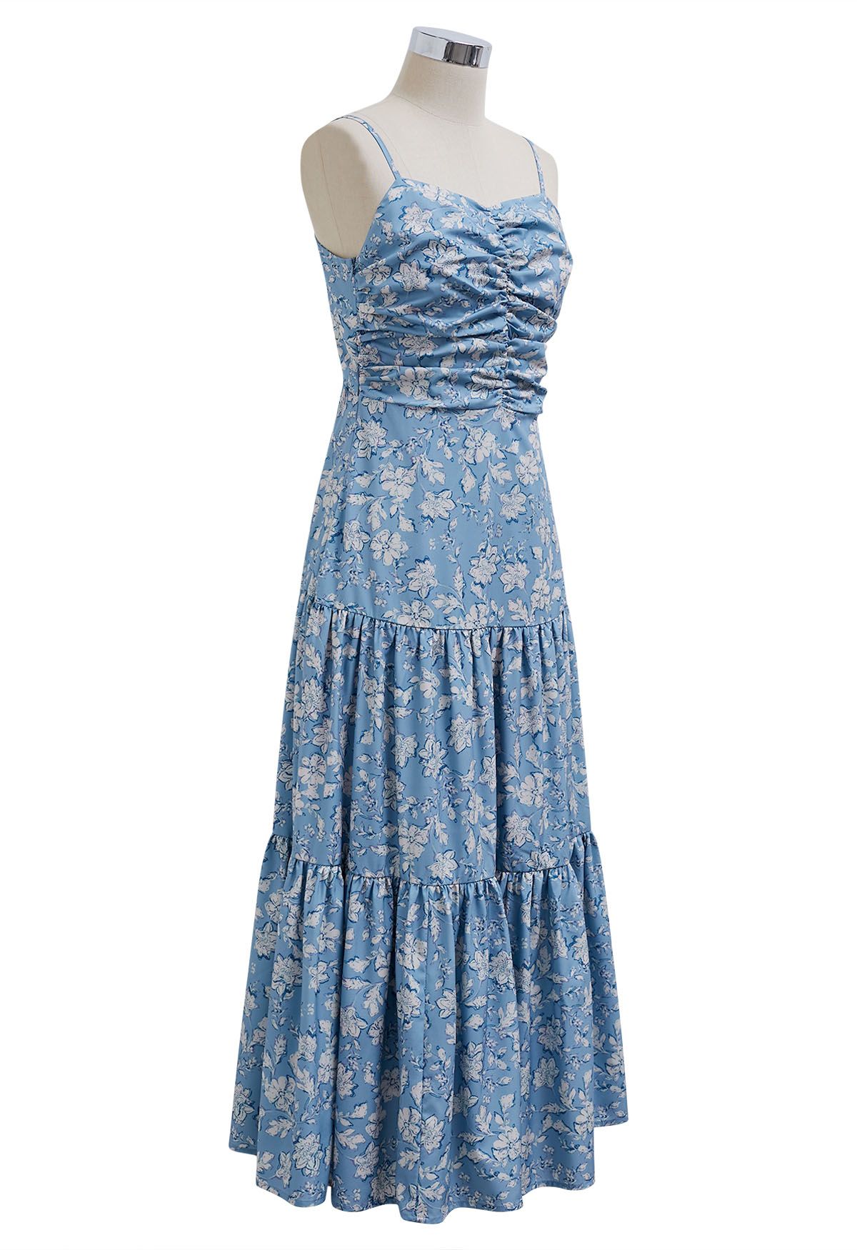 Vestido camisero con estampado floral y espalda con lazo en azul