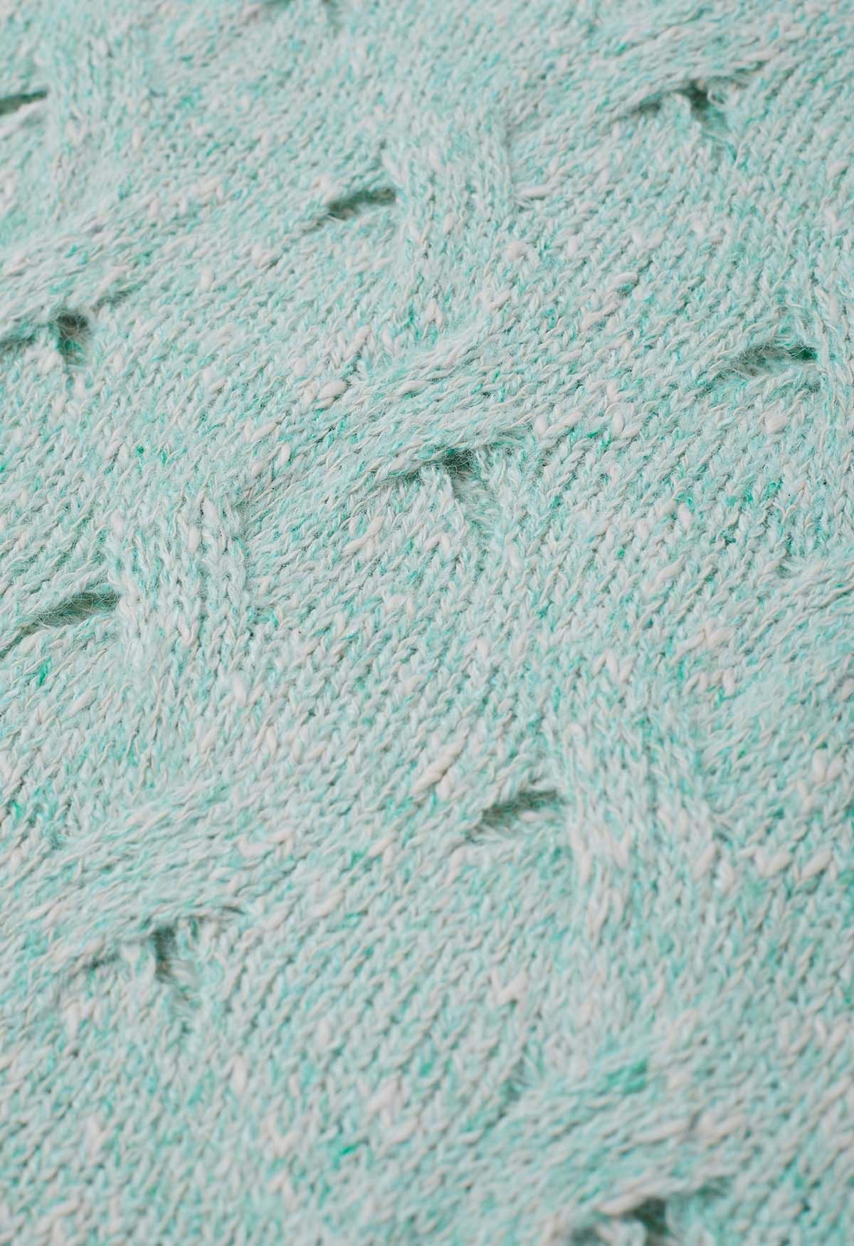 Suéter de punto trenzado de mezcla de colores ahuecado en color menta