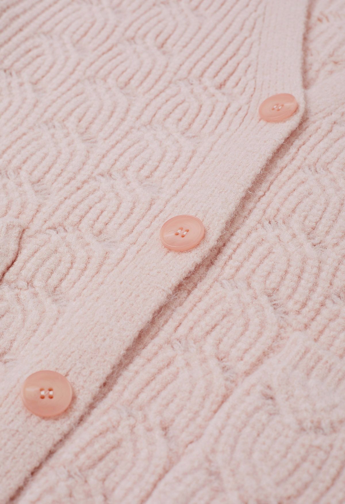 Cárdigan de punto pointelle con botones en la parte delantera en rosa