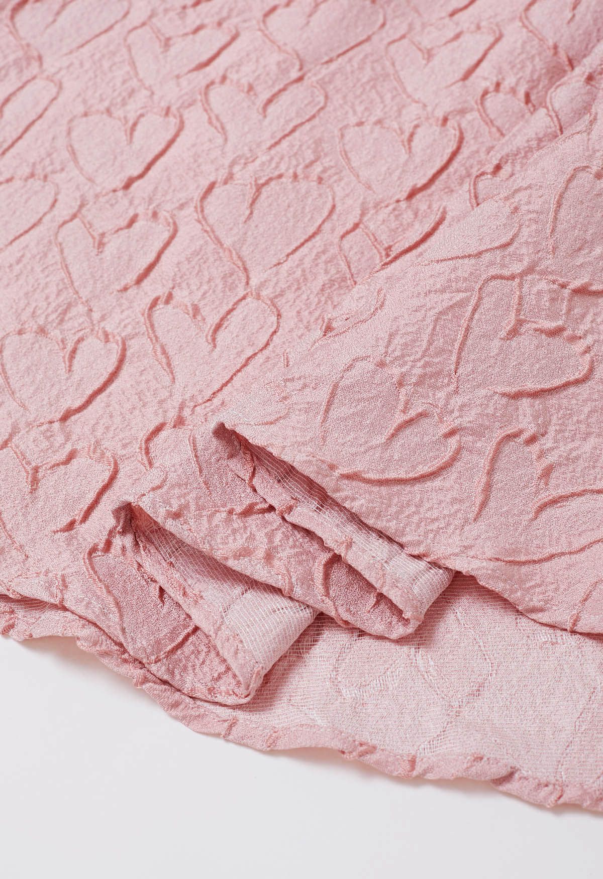 Falda acampanada con textura de corazón pastel en rosa