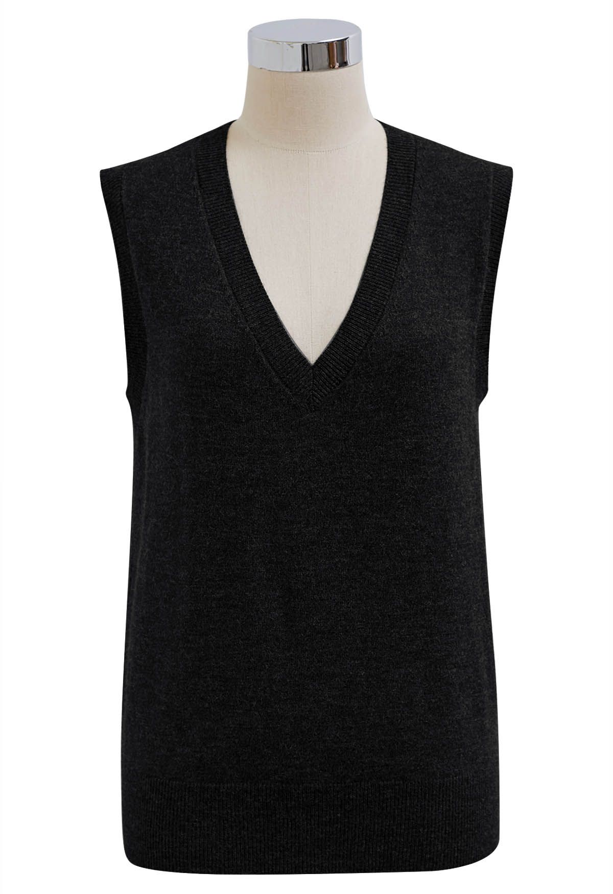 Conjunto de top de punto sin mangas con cuello en V y falda plisada en negro