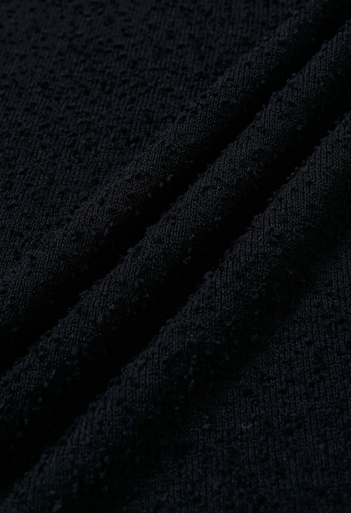 Vestido largo sin mangas de punto con textura con flecos en negro