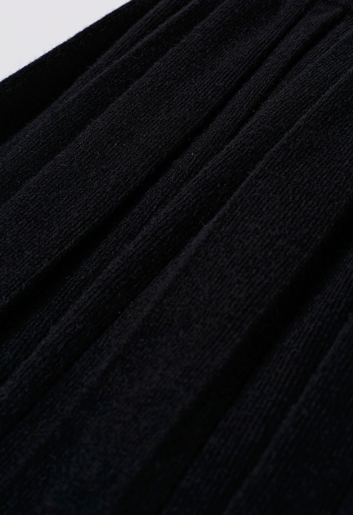Minifalda plisada con cintura elástica en negro