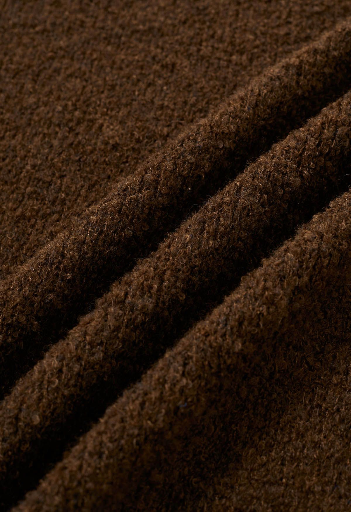 Cárdigan largo de punto con cinturón y capucha en marrón