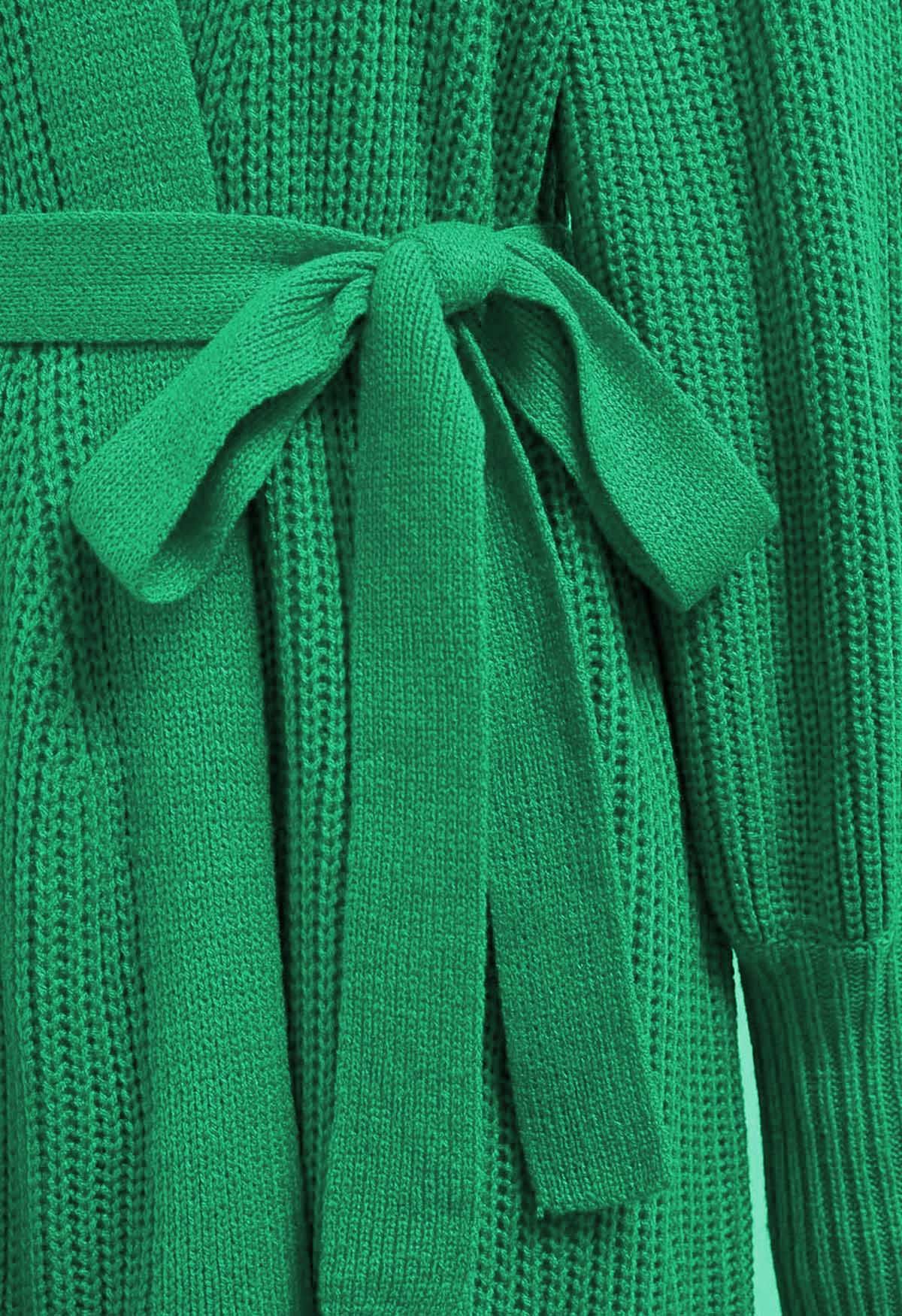 Cárdigan cruzado con cinturón y manga farol en verde